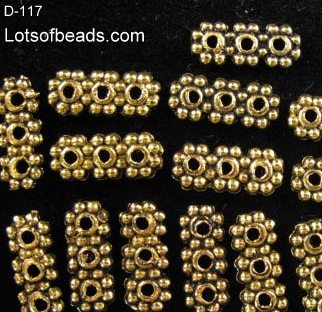 Gold Bali style three strand spacer bar